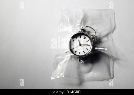 Wecker schrumpfen in Plastikfolie eingewickelt Stockfoto