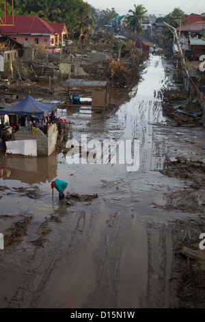 Acacia Street, Cagayan De Oro, Mindanao, Philippinen & Anschluss an tropischer Sturm Washi (PAGASA, Sendong). Stockfoto