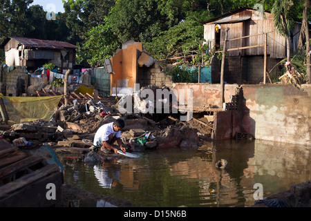 Acacia Street, Cagayan De Oro, Mindanao, Philippinen & Anschluss an tropischer Sturm Washi (PAGASA, Sendong). Stockfoto