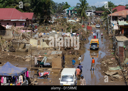 Acacia Street, Cagayan De Oro, Mindanao, Philippinen & Anschluss an tropischer Sturm Washi (PAGASA, Sendong). Stockfoto