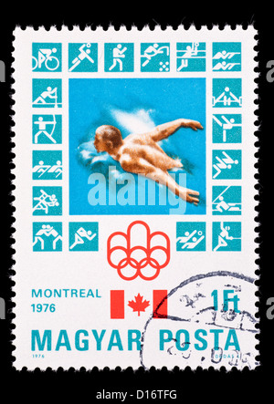 Briefmarke aus Ungarn mit einem Schwimmer, ausgestellt für den Olympischen Spielen 1976 in Montreal. Stockfoto