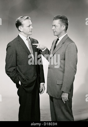 Zwei Geschäftsleute, die erhitzt Diskussion Stockfoto