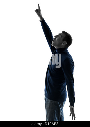 ein Mann zeigte sich überrascht voller Länge im Silhouette Studio isoliert auf weißem Hintergrund Stockfoto