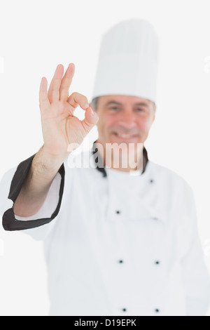 Glücklich männlichen Chef in Uniform gestikulieren ok Sign. Stockfoto