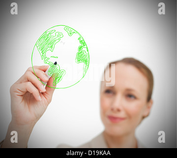 Frau Zeichnung Globus mit marker Stockfoto