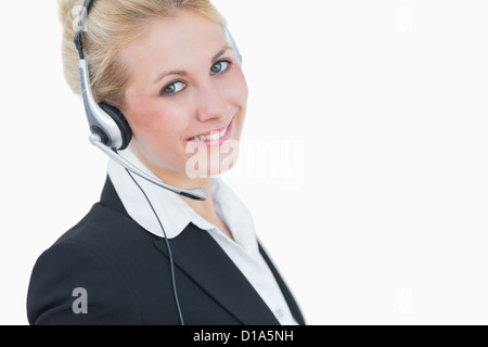 Close-up Portrait von junge Geschäftsfrau trägt Kopfhörer Stockfoto