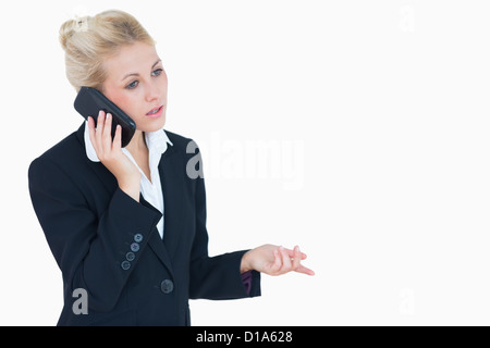 Junge Geschäftsfrau mit Handy Stockfoto