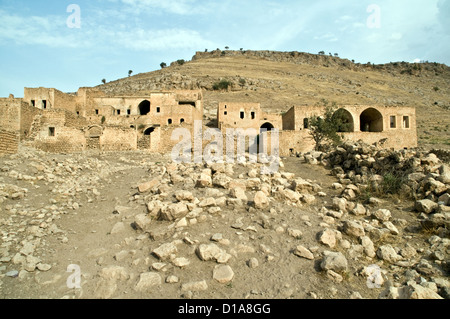 Honigfarbenen Steinhäuser in das alte Dorf Dereici in der syrisch-Tur-Abdin Region Südosten der Türkei. Stockfoto