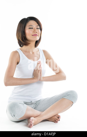 Porträt einer schönen chinesischen Frau Yoga Übung Stockfoto