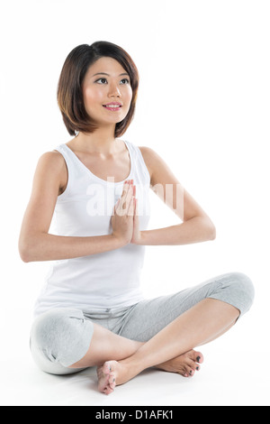 Porträt einer schönen chinesischen Frau Yoga Übung Stockfoto