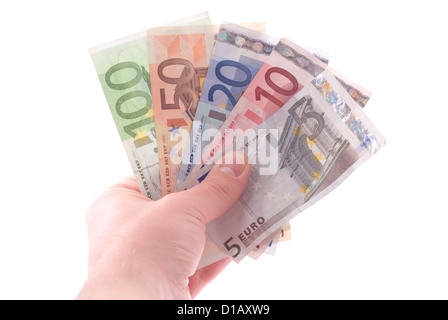 Euro-Banknoten in einer Hand. Isoliert auf weiss. Stockfoto