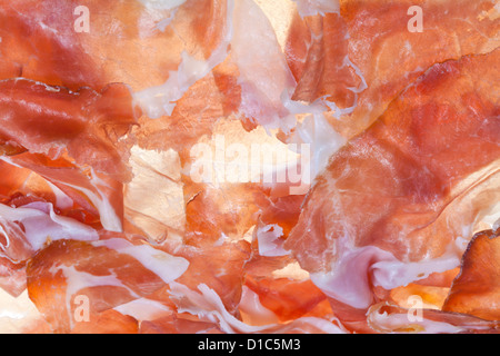 Hintergrund aus geschnittenen Schinken Prosciutto di Parma hautnah Stockfoto