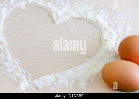 Herz des Mehls Backen Hintergrund Konzept Stockfoto