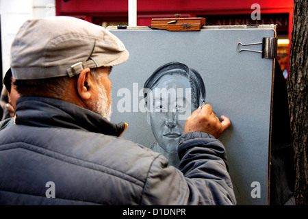 Künstler bei der Arbeit am Portrait Place du Tertre Montmartre Paris Frankreich Europa Stockfoto