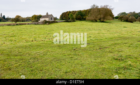 Pfarrkirche St. Oswald in verlassenen Weiler Widford in Oxfordshire in Windrush Tal Stockfoto