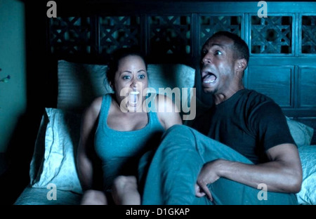 Ein HAUNTED HOUSE 2013 Open Road Filme Produktion mit Essence Atkins als Keisha und Marlon Wayans als Malcolm Stockfoto