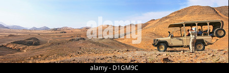 Touristen genießen eine riesige Aussicht über den Hartman-Tal, Kunene Region Norden Namibias Stockfoto