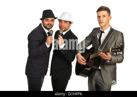 Musikband der drei Männer, eine Gitarre spielen und singen zwei Mikrofone Stockfoto