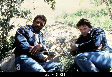 Flucht In Ketten trotzig diejenigen, die Monroe Cullen (Carl Weathers), Johnny Johnson (Robert Urich) *** lokalen Caption *** 1958-- Stockfoto