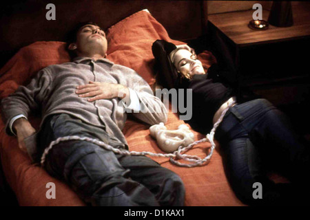 Machinist Machinist Jude Law, Jennifer Jason Leigh Allegra (Jennifer Jason Leigh) Versteht Sich Prime Mit Dachmarke Stockfoto