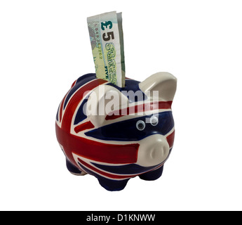 British-Sparschwein mit Noten Stockfoto