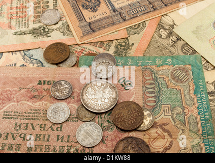 Die alten Banknoten und Münzen Stockfoto