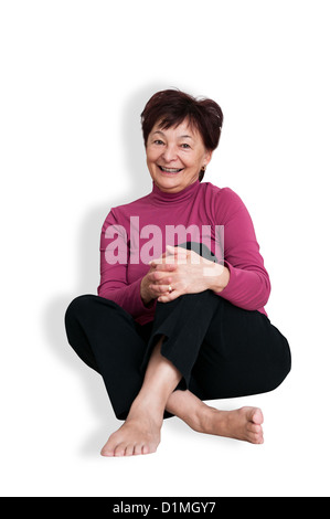 Porträt der lächelnde ältere Frau - isoliert auf weiss Stockfoto