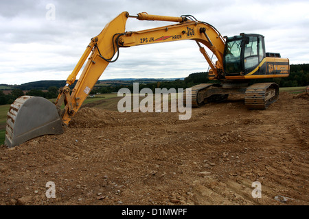 Baumaschinen auf neue Autobahn Stockfoto