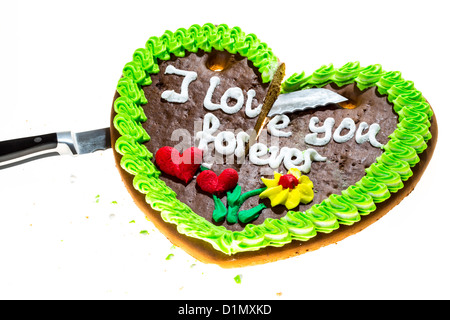 Lebkuchenherz, in zwei Stücke schneiden, Symbol für fertige Liebe, Beziehung. Stockfoto