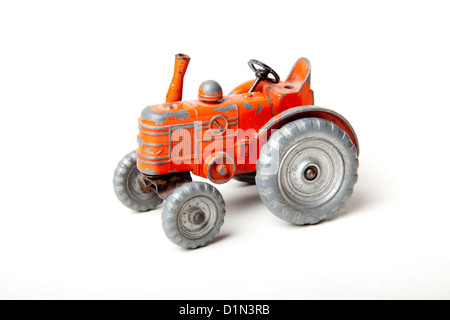 Orange Spielzeug-Traktor Stockfoto