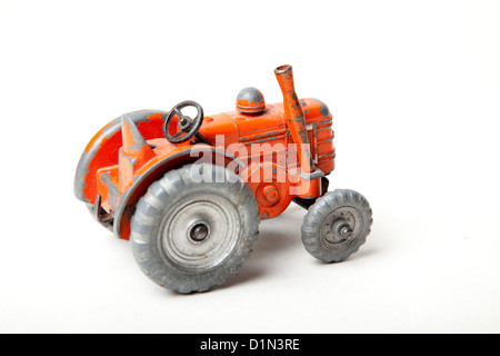 Orange Spielzeug-Traktor Stockfoto