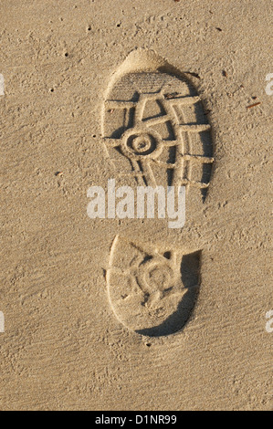 Menschliche Präsenz in goldenen Strandsand Stockfoto