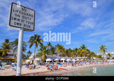 Florida Key West Florida, Keys Duval Street, South Beach, öffentlich, südlichste, Sonnenanbeter, Palmen, Wasserschild am Atlantik, Logo, kein Rettungsschwimmer im Dienst Stockfoto