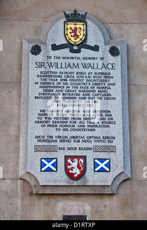 Der Londoner City, West Smithfield A Gedenktafel an William Wallace an der Wand des St Barts hospital Stockfoto