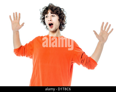 ein junger Mann gestikulieren überrascht Portrait im Studio weißen Hintergrund Stockfoto