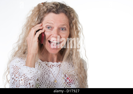 Reife Frau am Handy Handy-Ausdruck Stockfoto