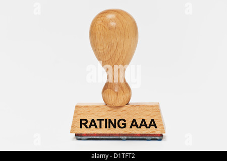Detail-Foto von einem Stempel mit der Aufschrift Rating AAA, Hintergrund weiß Stockfoto
