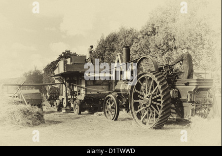 Dreschen die alte altmodische Weise am Singleton Weald und Downland Freilichtmuseum, in der Nähe von Chichester, West Sussex uk Stockfoto