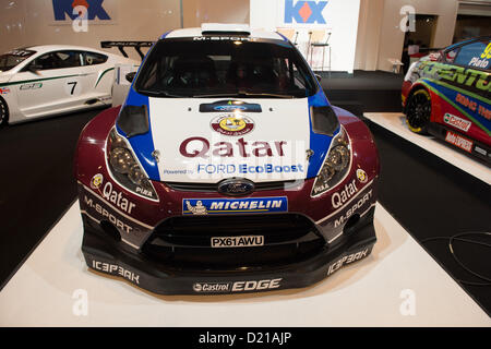 Das neue Quatar Ford Fiesta-Rallye-Auto hat heute von Malcolm Wilson und Fahrer Mads Östberg auf der Autosport International 2013 - NEC Stockfoto