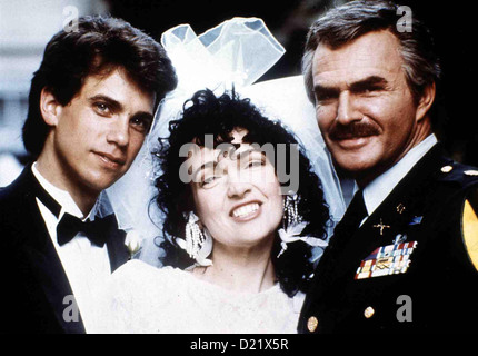 Liebe Spiele moderne Liebe Robby Benson, Karla DeVito, Burt Reynolds Nachdem Colonel Parker (Burt Reynolds, R) Seinen zukuenftigen Stockfoto