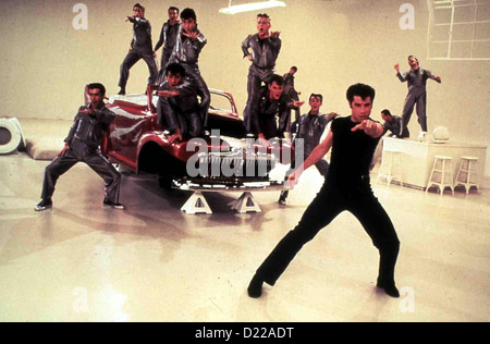 Schmiere einfetten Danny (John Travolta) in Szene *** lokalen Caption *** 1978 Paramount Stockfoto