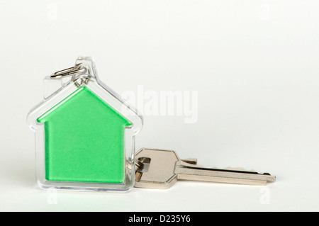 Schlüsselanhänger mit Abbildung des grünen Hauses Stockfoto