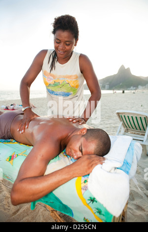 Ipanema Strand massage Stockfoto