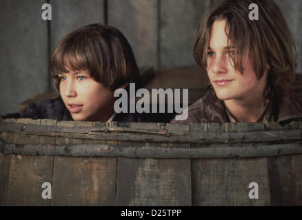 Tom Und Huck Tom Huck Jonathan Taylor Thomas, Brad Renfro Tom (Jonathan Taylor Thomas) und Huck (Brad Renfro) Stehlen von Stockfoto