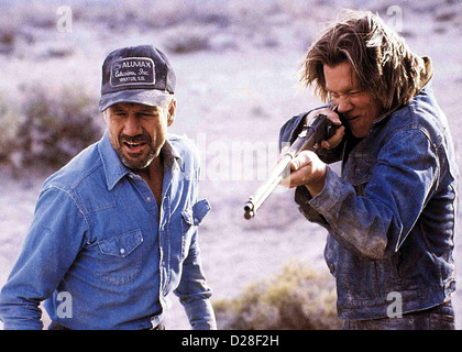 Im Land Der Raketenwuermer Zittern Fred Ward, Kevin Bacon Earl (Fred Ward, l) Und Val (Kevin Bacon, R) Sind Auf Dem Weg sterben Stockfoto