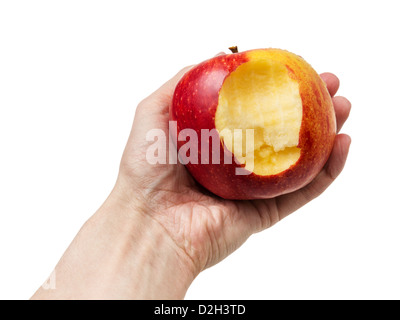 angebissene Apfel in der Hand, isoliert auf weißem Hintergrund Stockfoto