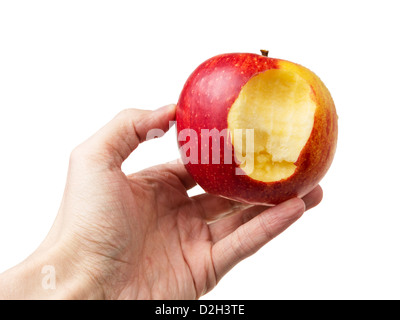 angebissene Apfel in der Hand, isoliert auf weißem Hintergrund Stockfoto