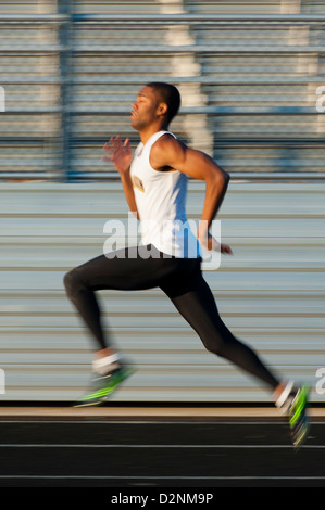 African American Black Track Runner Sprinter in Kauf Stockfoto