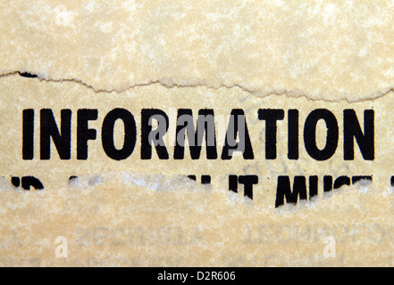 Informationstext auf Papier Loch Stockfoto