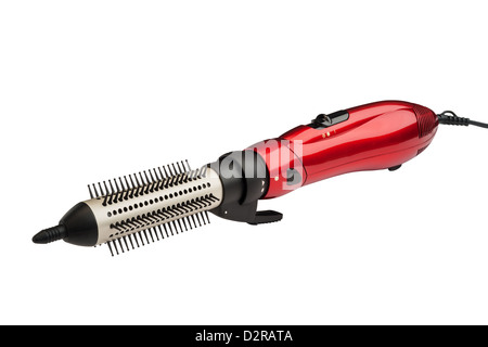 Glamouröse rote Haarstyler isoliert auf weiss mit Beschneidungspfad. Stockfoto